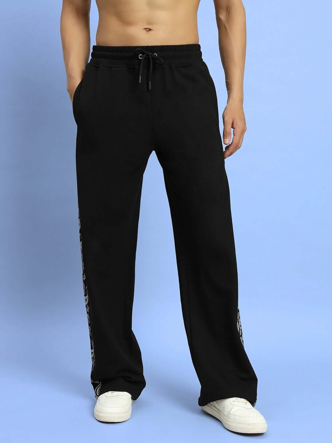 Black relaxed fit joggers by DUDS, featuring customizable sizing and made-to-order craftsmanship. Ideal for comfort and style.