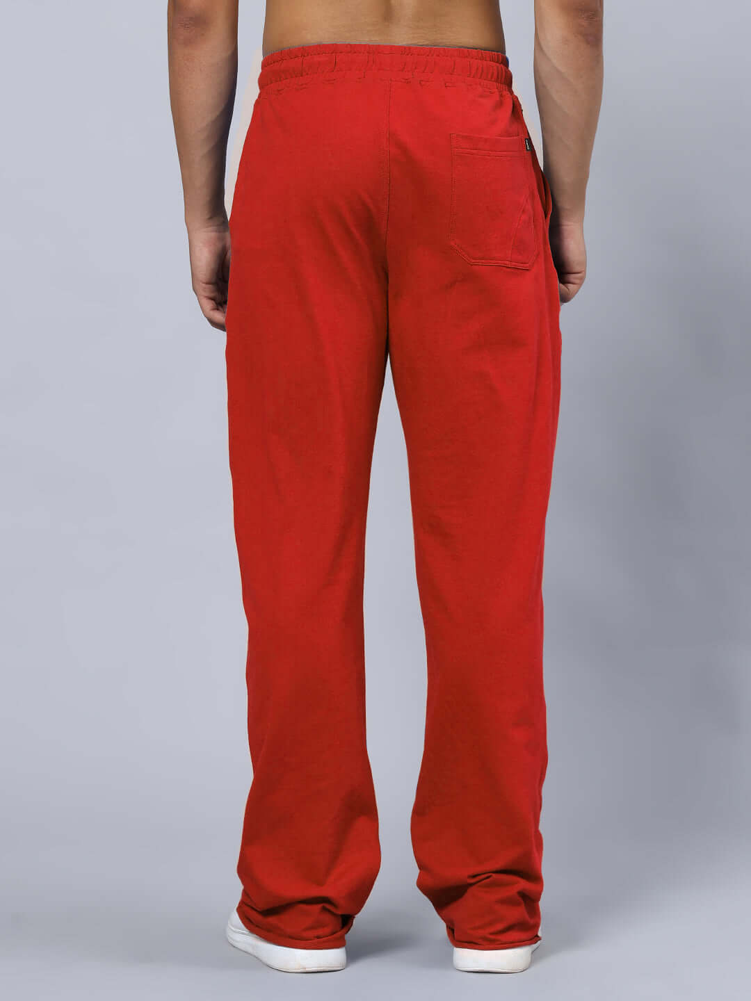 Back view of WARRIOR PRINTED GYM RELAXED FIT CO-ORD SET RED pants showcasing relaxed fit and bold red color.