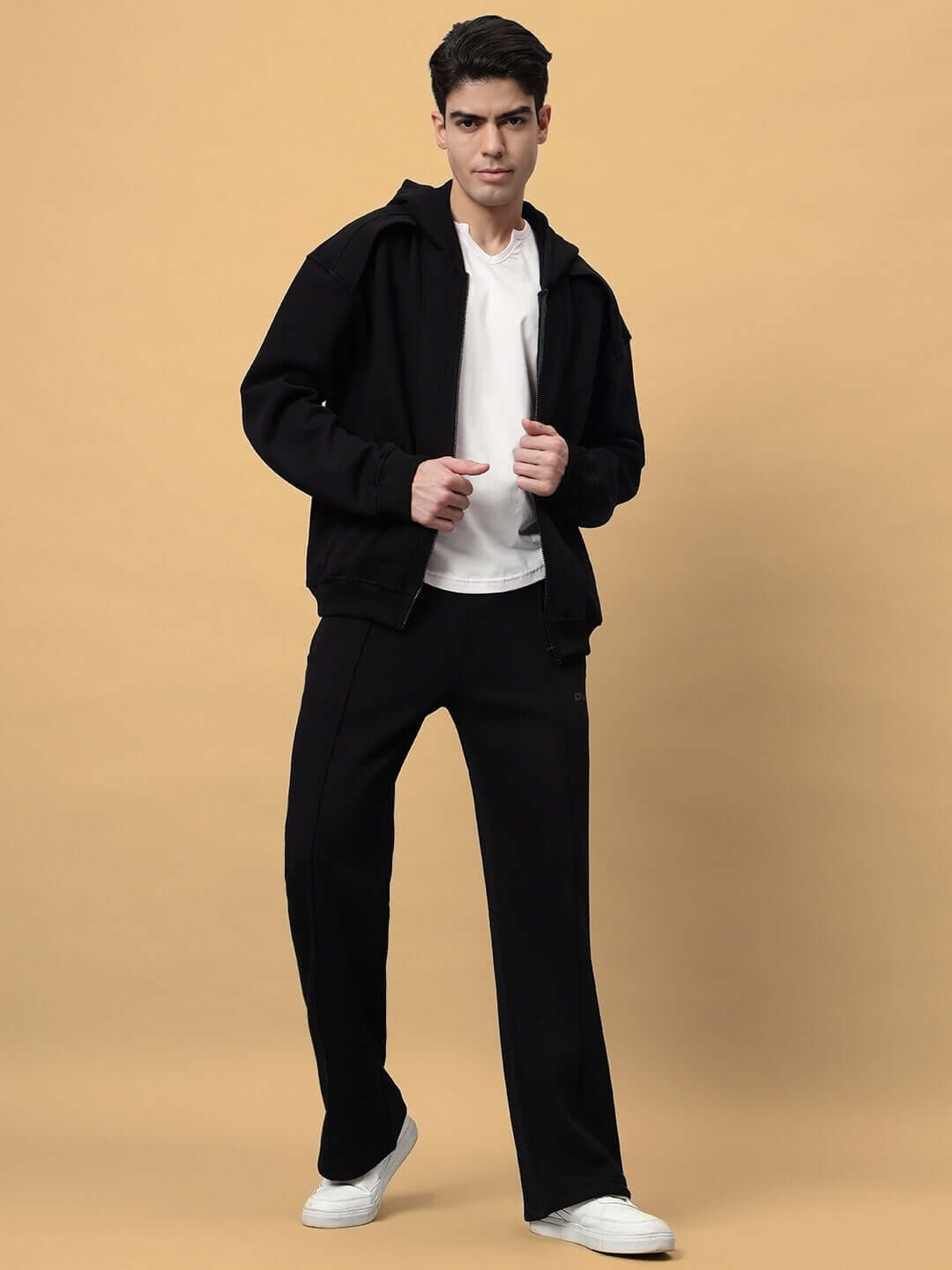 Man wearing WD ADMIRE COTTON FLEECE HOODIE BLACK with casual outfit.