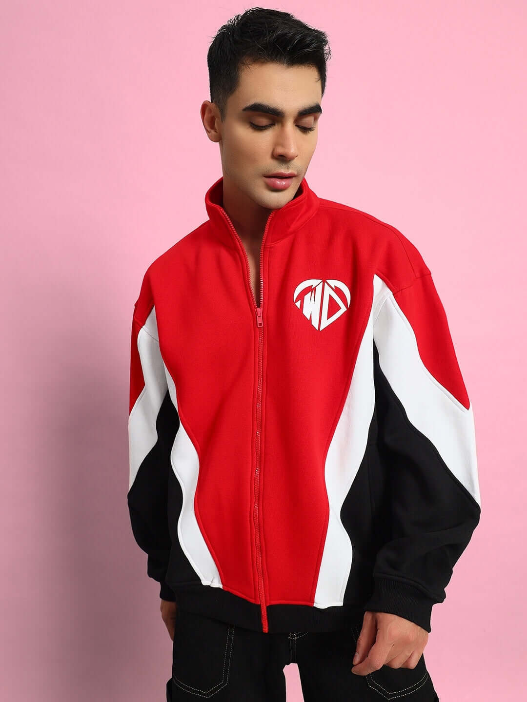 Model wearing WD ALFA Colorblock Jacket in red with black and white accents, customized fit available, made by DUDS tailors.