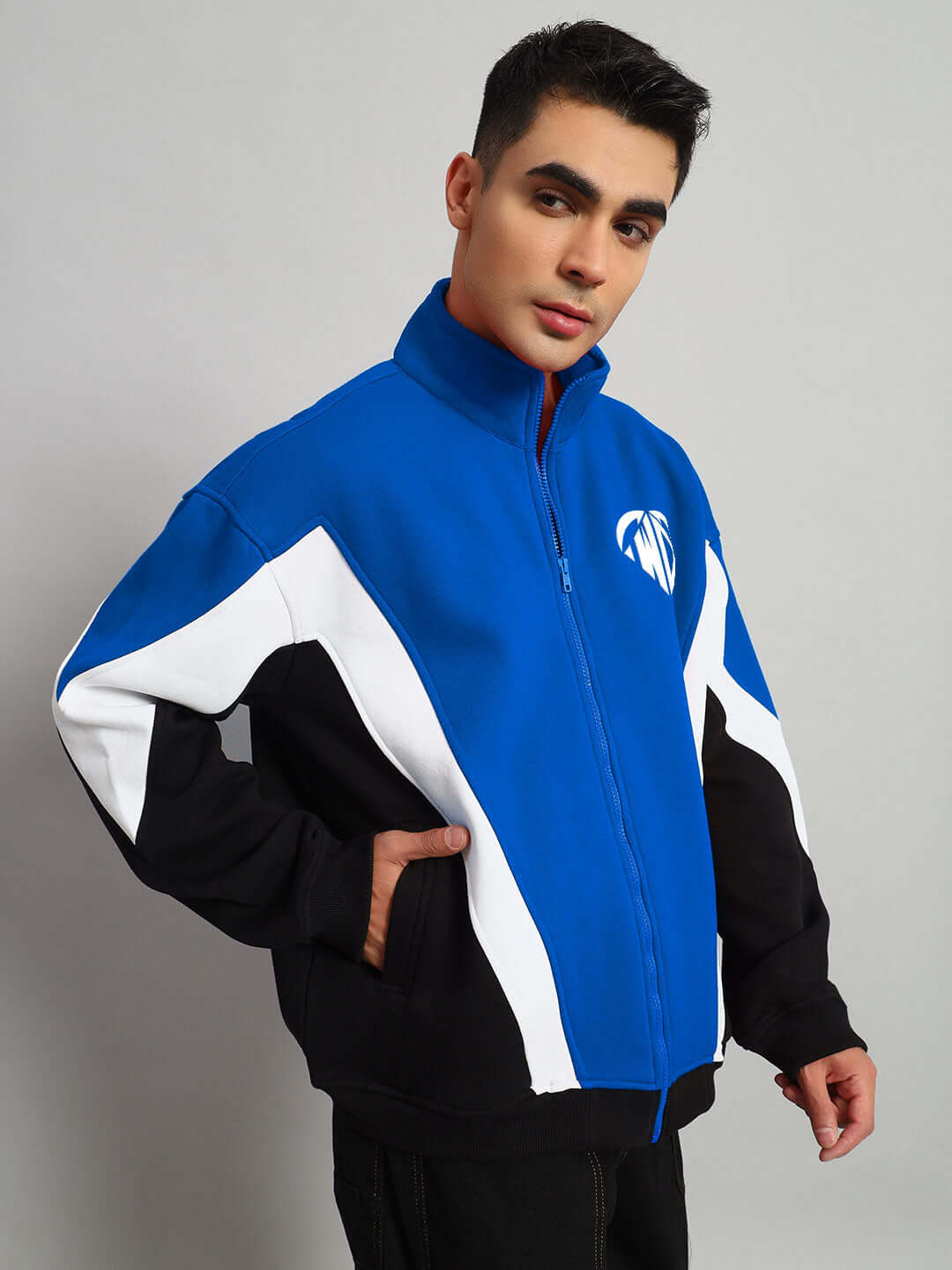 WD ALFA Fleece Colorblock Jacket in Blue with black and white accents, worn by a model. Available in custom fit with 7-10 days dispatch.