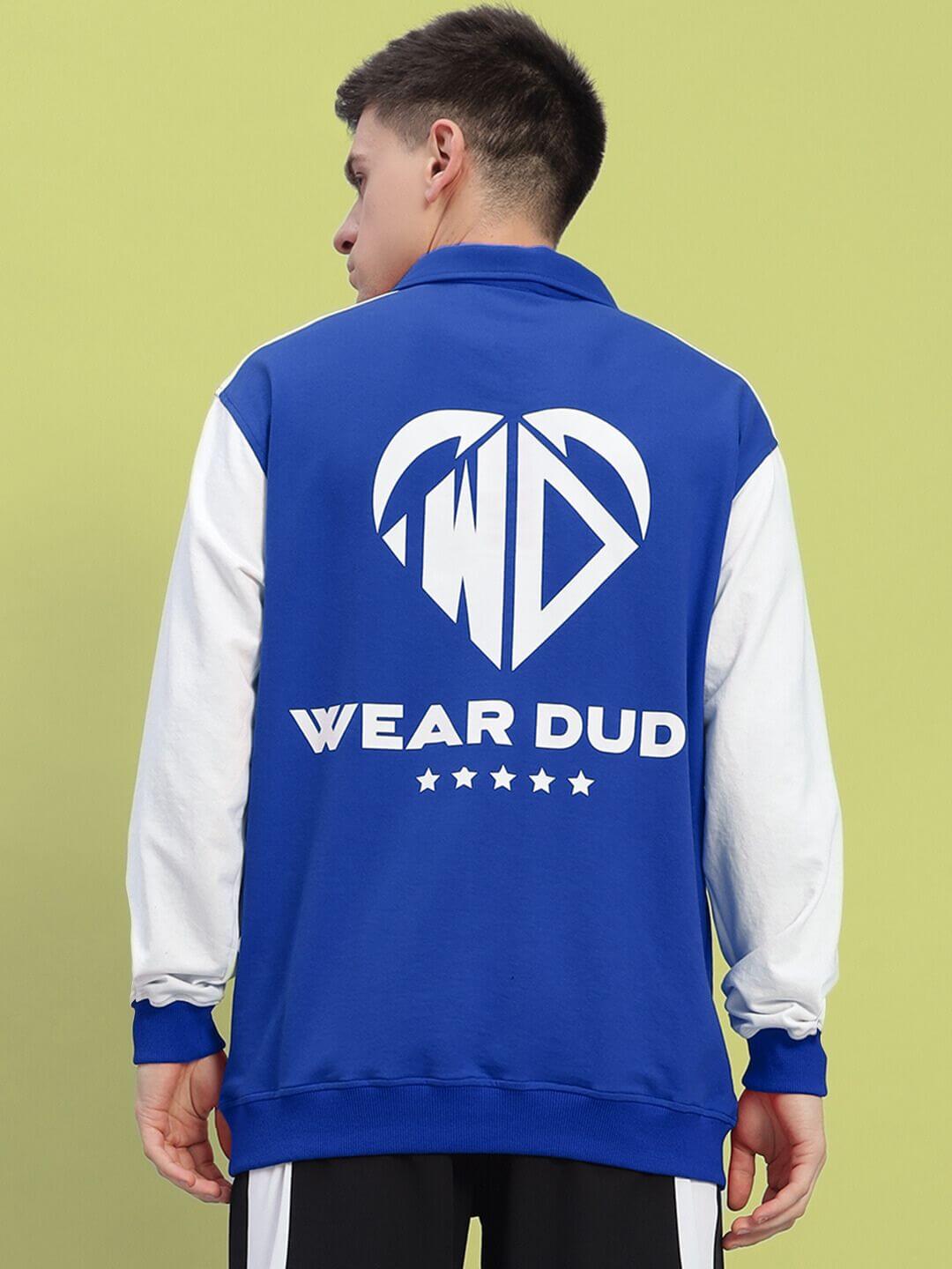 Back view of a blue-white WD Corvus Sweatshirt with bold logo, made from premium cotton French terry lycra, worn by a person.
