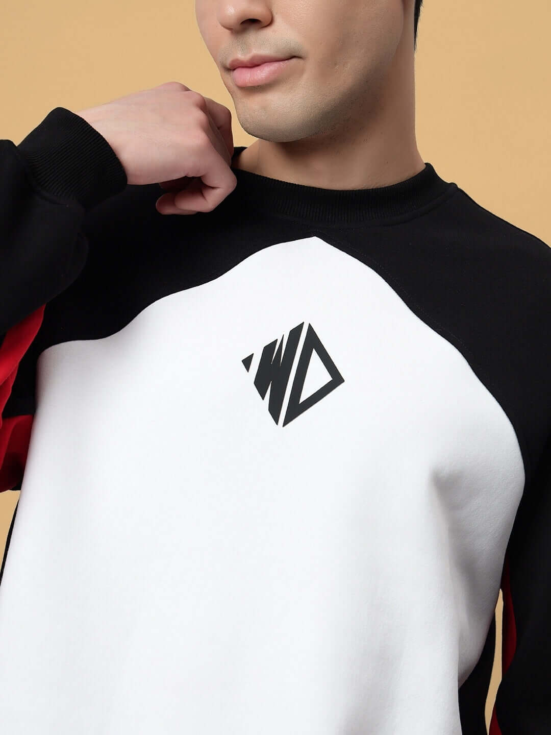 WD Fervid Fleece Colorblock Sweatshirt in black with logo detail, worn by model. Custom fit available. Made by experienced tailors.