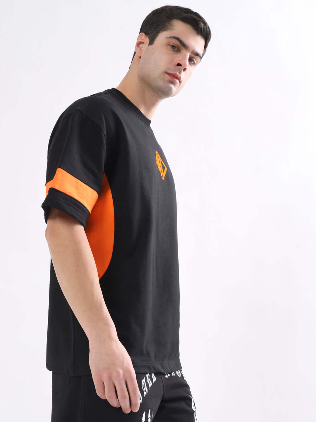 WD GORBCORE oversized black-orange T-shirt, premium cotton blend, modeled for fashion showcase, emphasizing casual style.