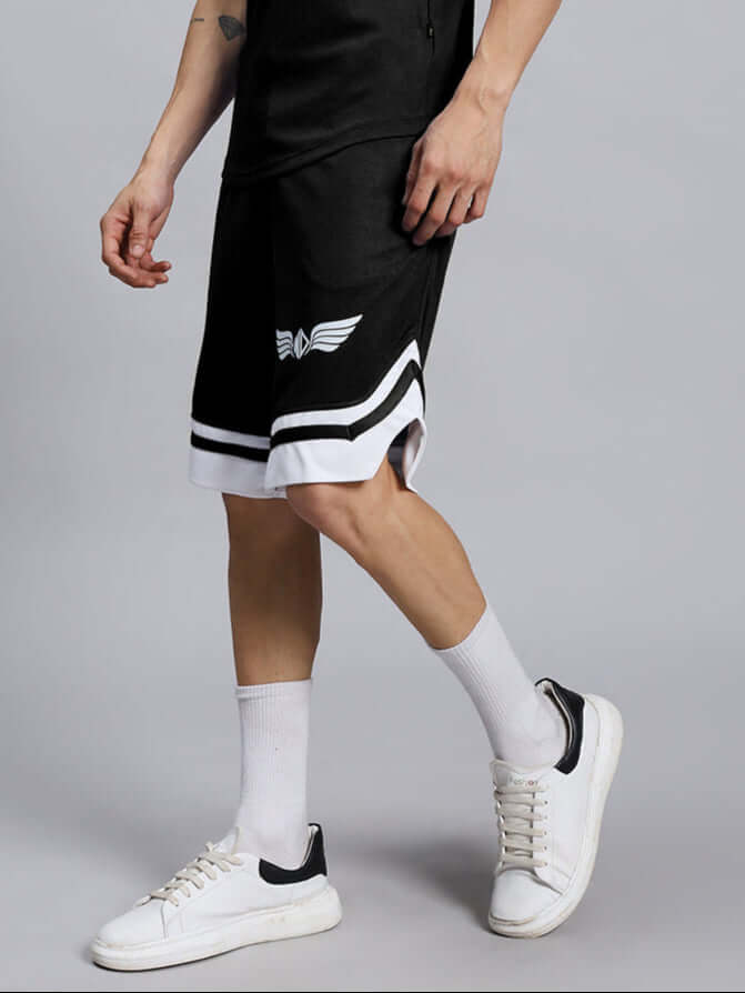 Man wearing WD Wings Regular Fit Shorts Men Black, showcasing comfort and style in breathable, premium fabric, perfect for versatile activities.