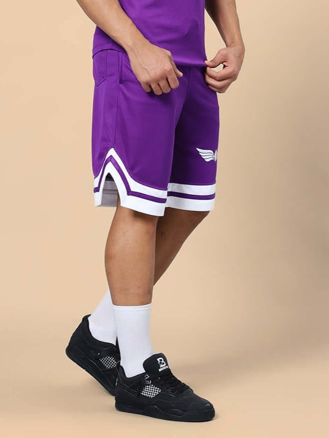 Man wearing WD Wings Regular Fit Shorts Purple for casual style and comfort.