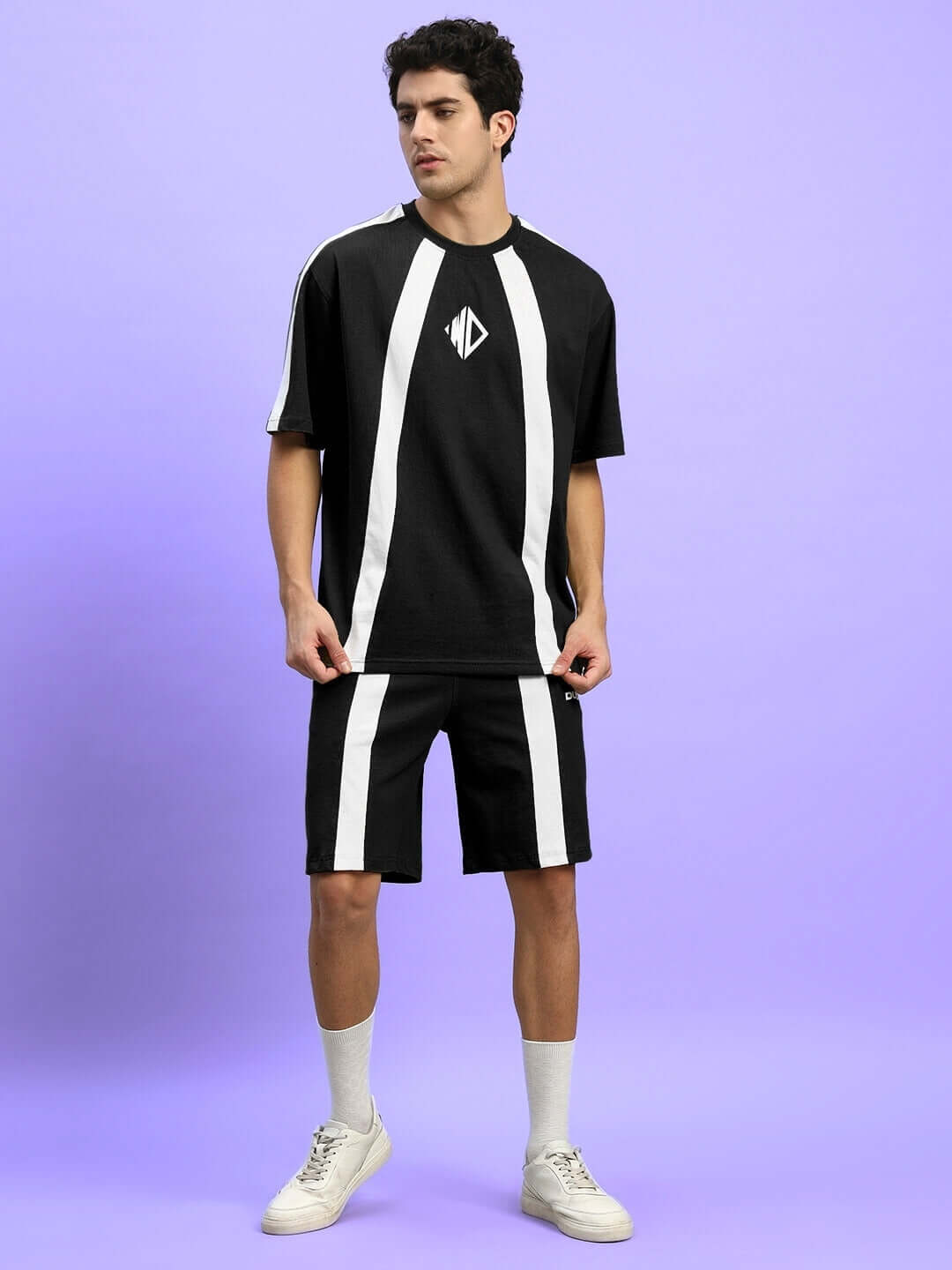 Model wearing Wideline Summer Co-ord Set in black, featuring a stylish premium cotton French terry design, ideal for casual summer wear.