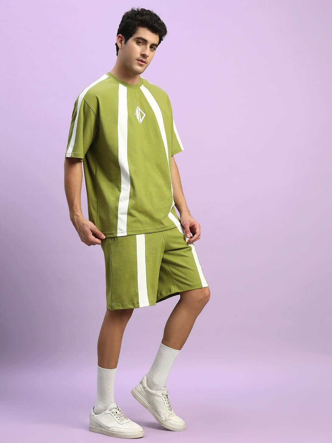 Man wearing WIDELINE SUMMER CO-ORD SET OLIVE GREEN featuring premium cotton fabric, perfect for casual wear.