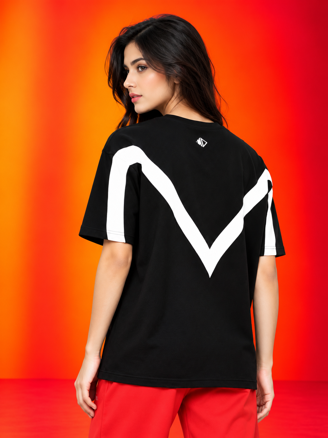 WOMEN ADROIT OVER-SIZED T-SHIRT BLACK with bold white chevron back design, stylish casual streetwear fashion