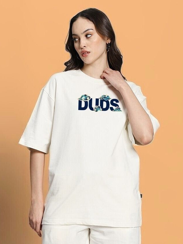 WOMEN CLOUD PRINTED OVERSIZED T-SHIRT OFF WHITE on model, showcasing streetwear style with relaxed fit and dreamy cloud design.