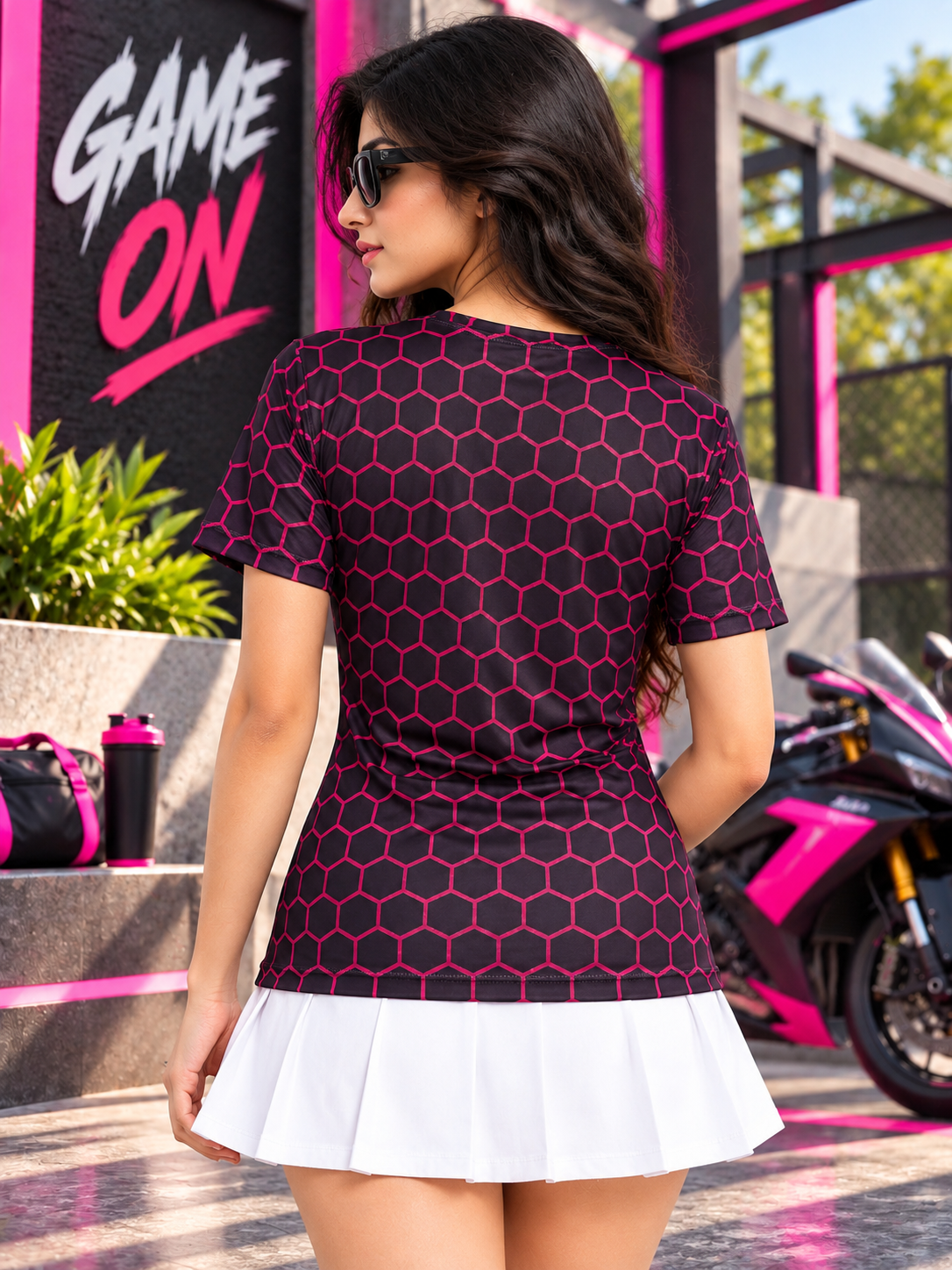 WOMEN HEXAGON PRINTED REGULAR FIT T-SHIRT BLACK styled with white pleated skirt for a sporty chic look