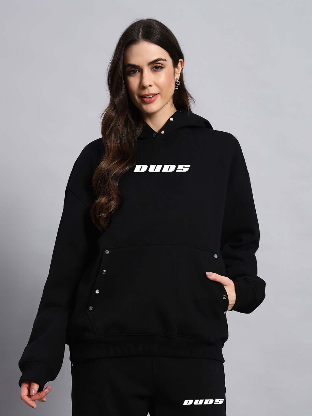 Woman wearing WOMEN RIGID FLEECE HOODIE BLACK by DUDS