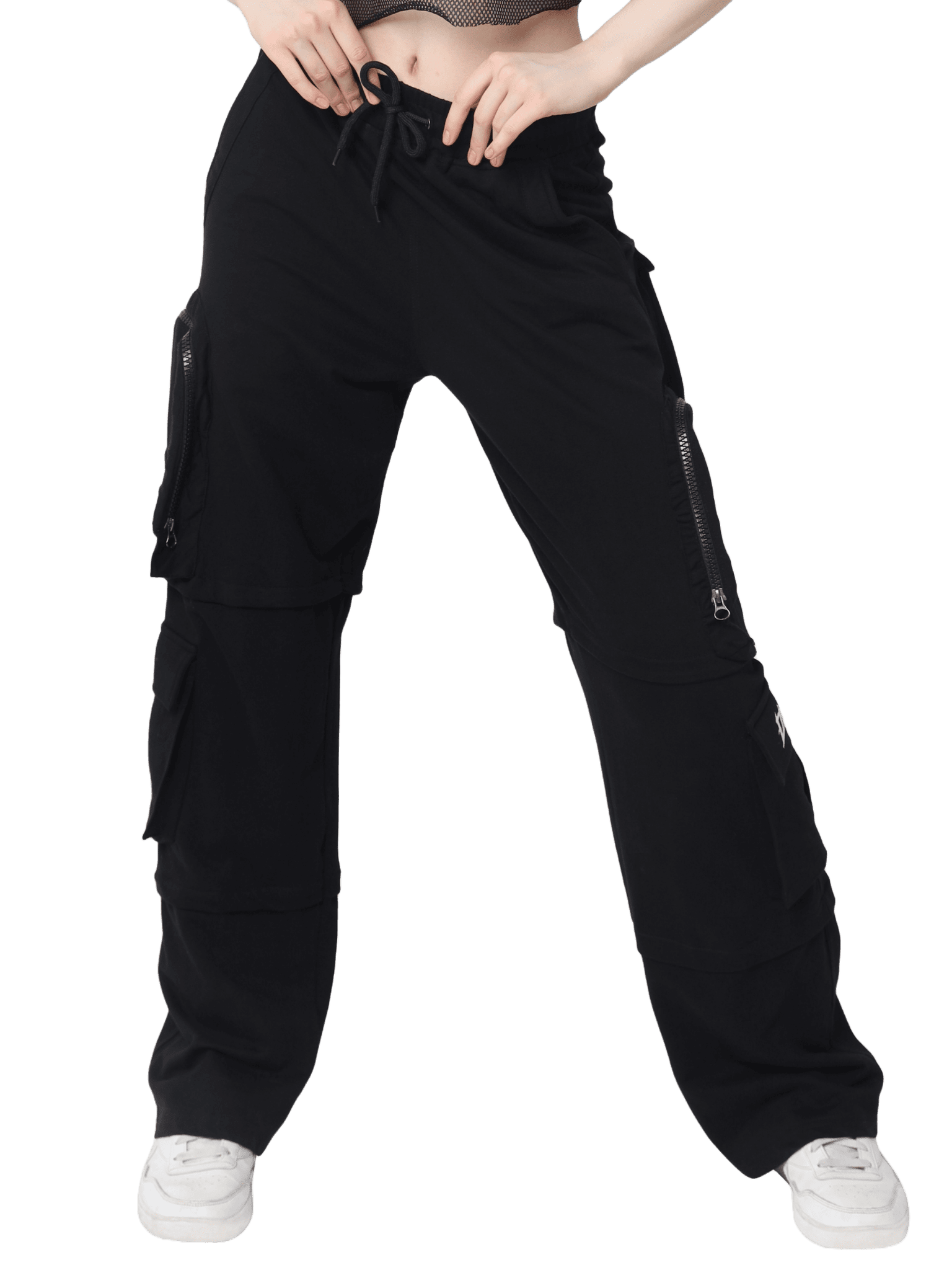 Model wearing WOMEN 8 POCKET CARGO PANT ZIPPER POCKET BLACK with sneakers, showcasing modern streetwear style and functionality.