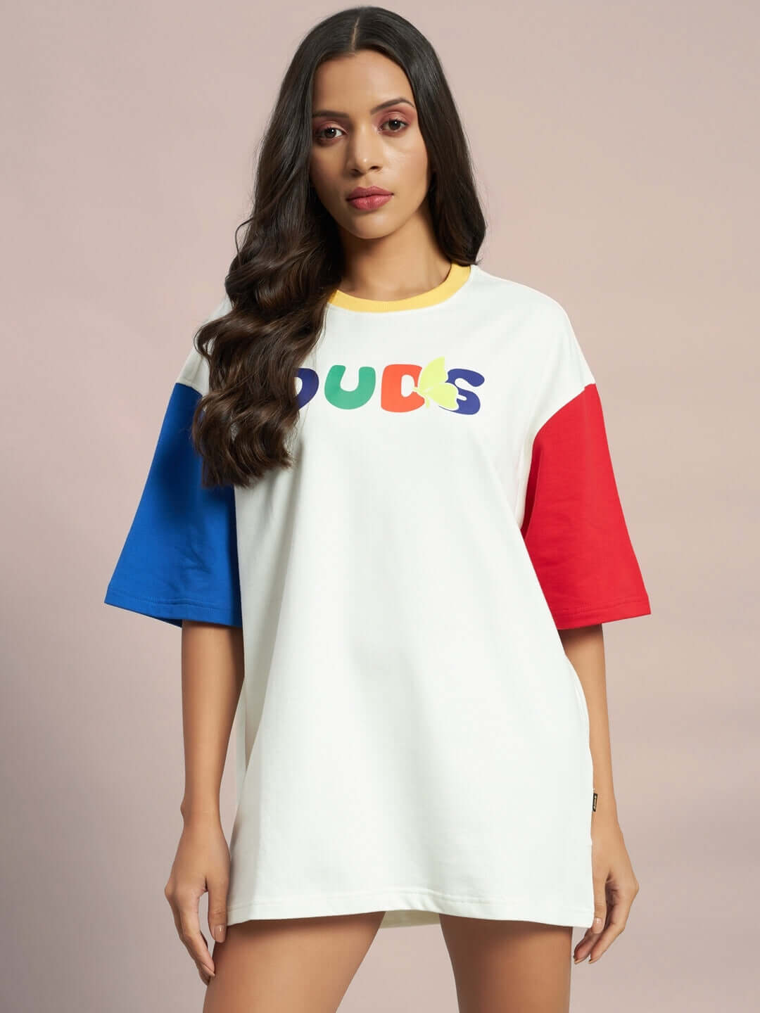 Woman wearing Women's Adonis Color Blocked Oversized T-Shirt in off white with multicolor sleeves, made of premium cotton French terry.