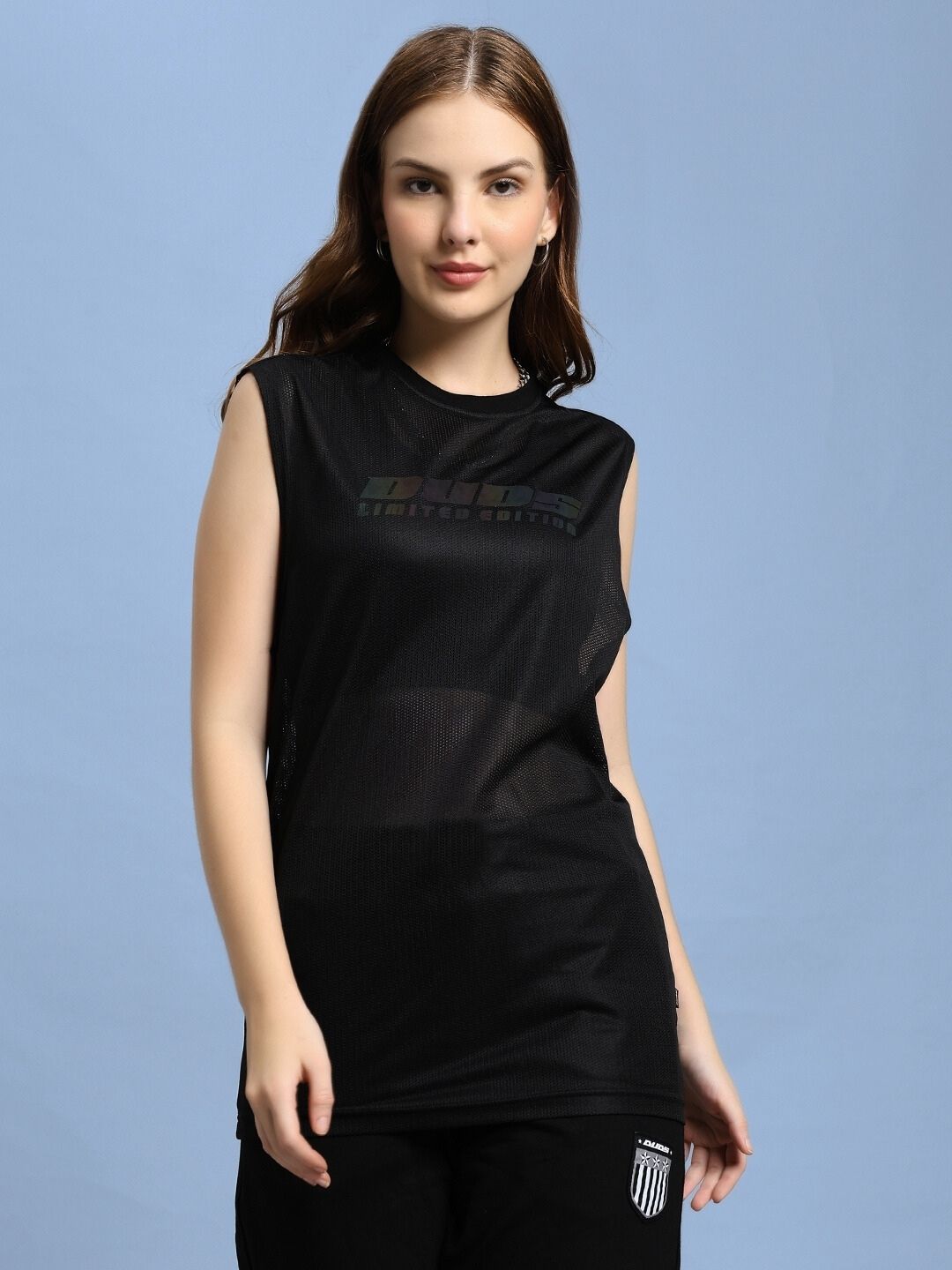 Model wearing WOMEN'S AIR-FLOW REGULAR FIT T-SHIRT BLACK, showcasing its breathable design and sleek fit ideal for active lifestyles.