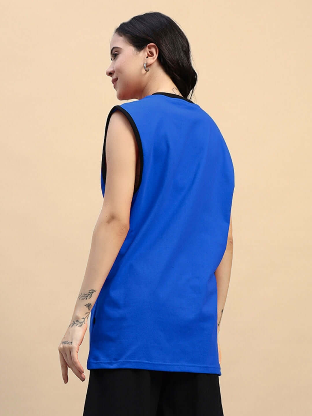 Back view of Women's Amiga Gym T-shirt in blue, sleeveless design, custom fit option available, ideal for workouts.