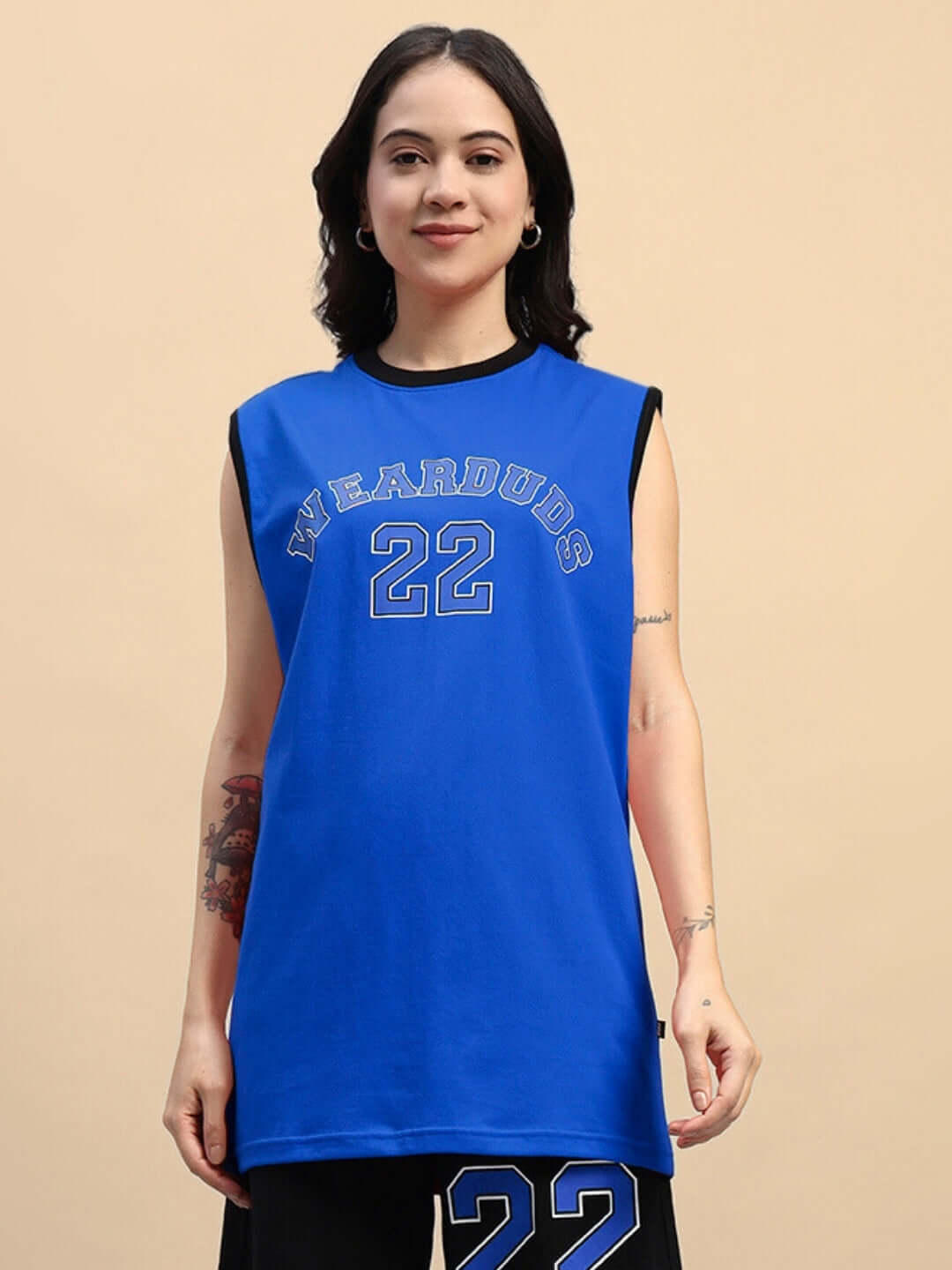 Woman wearing blue Women's Amiga Gym T-Shirt featuring 'WEARDUDS 22', showcasing casual athletic fashion.