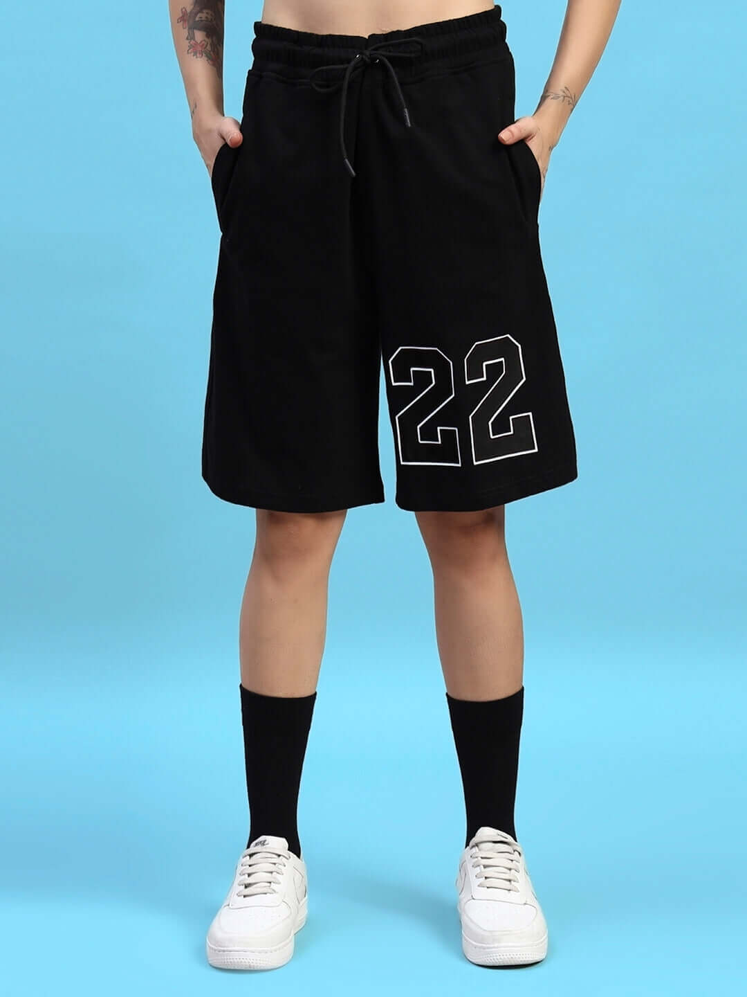 Black women's regular fit shorts with '22' design, featuring pockets and drawstring, customizable size option available.