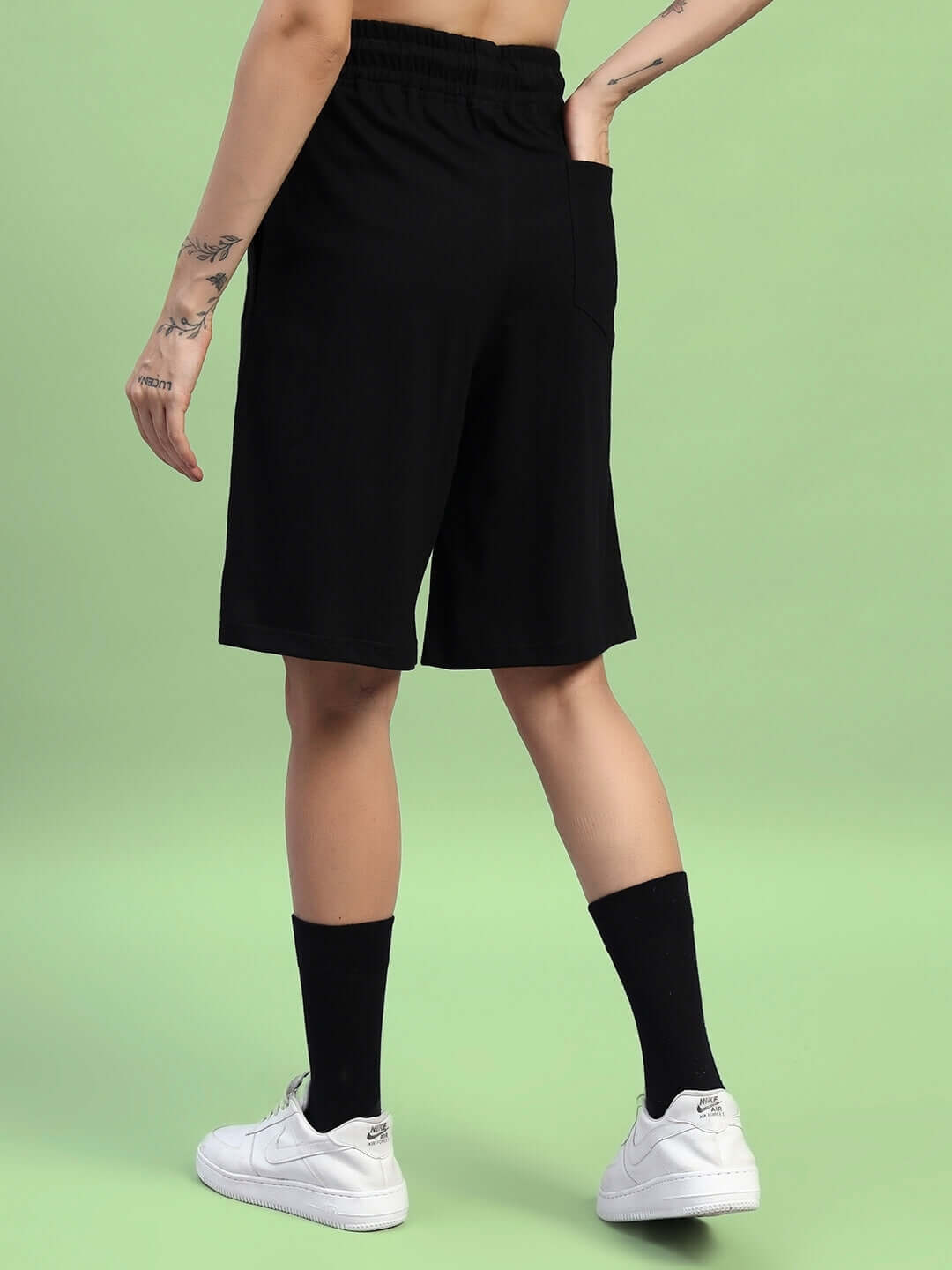 Back view of WOMEN'S AMIGA REGULAR FIT SHORTS BLACK RED, showcasing sporty design and comfortable fit.