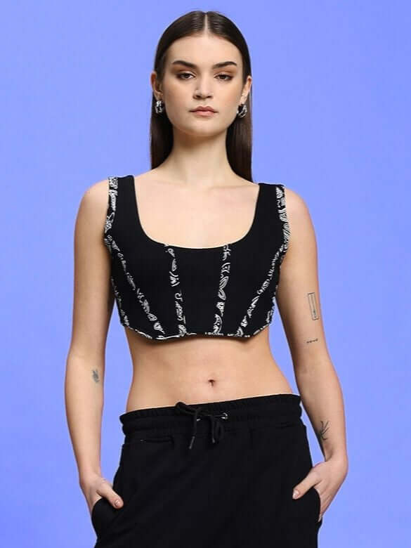 Model wearing women's black Amisha regional crop top, featuring premium heavy gauge 100% cotton fabric, stylish and comfortable design.