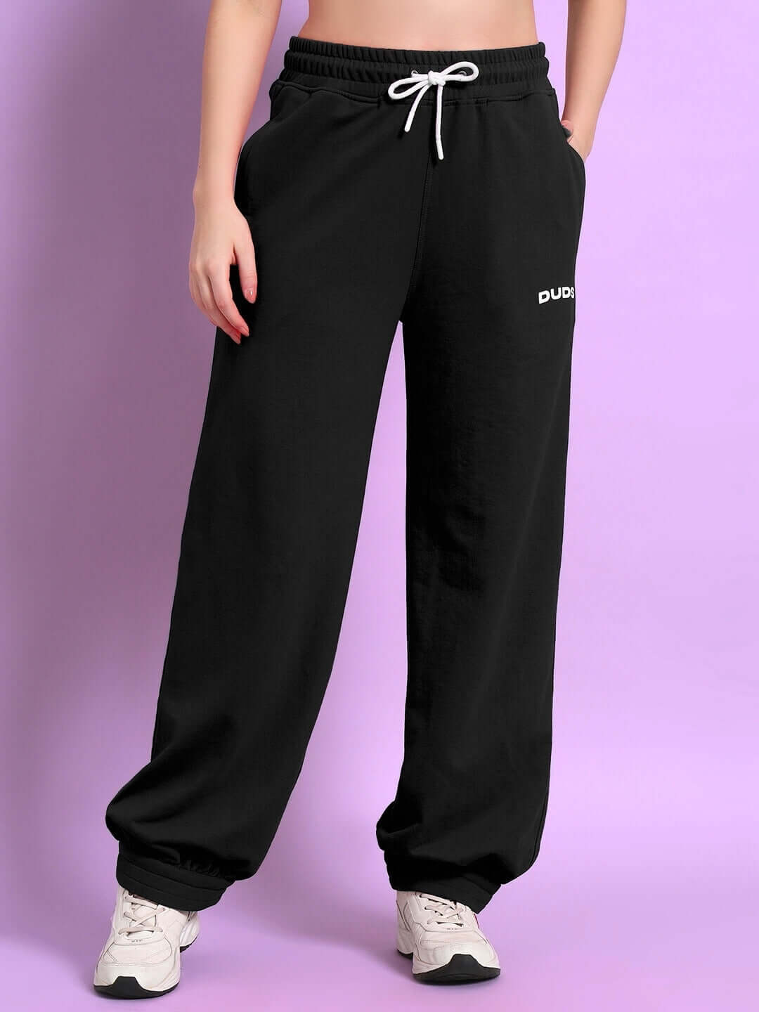 Women's black Austrian relaxed-fit joggers by DUDS, featuring a customizable fit option for comfort and style.