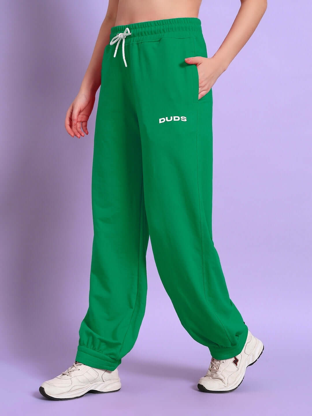 Green women's Austrian relaxed-fit joggers by DUDS, featuring a comfortable design and customizable sizing options.