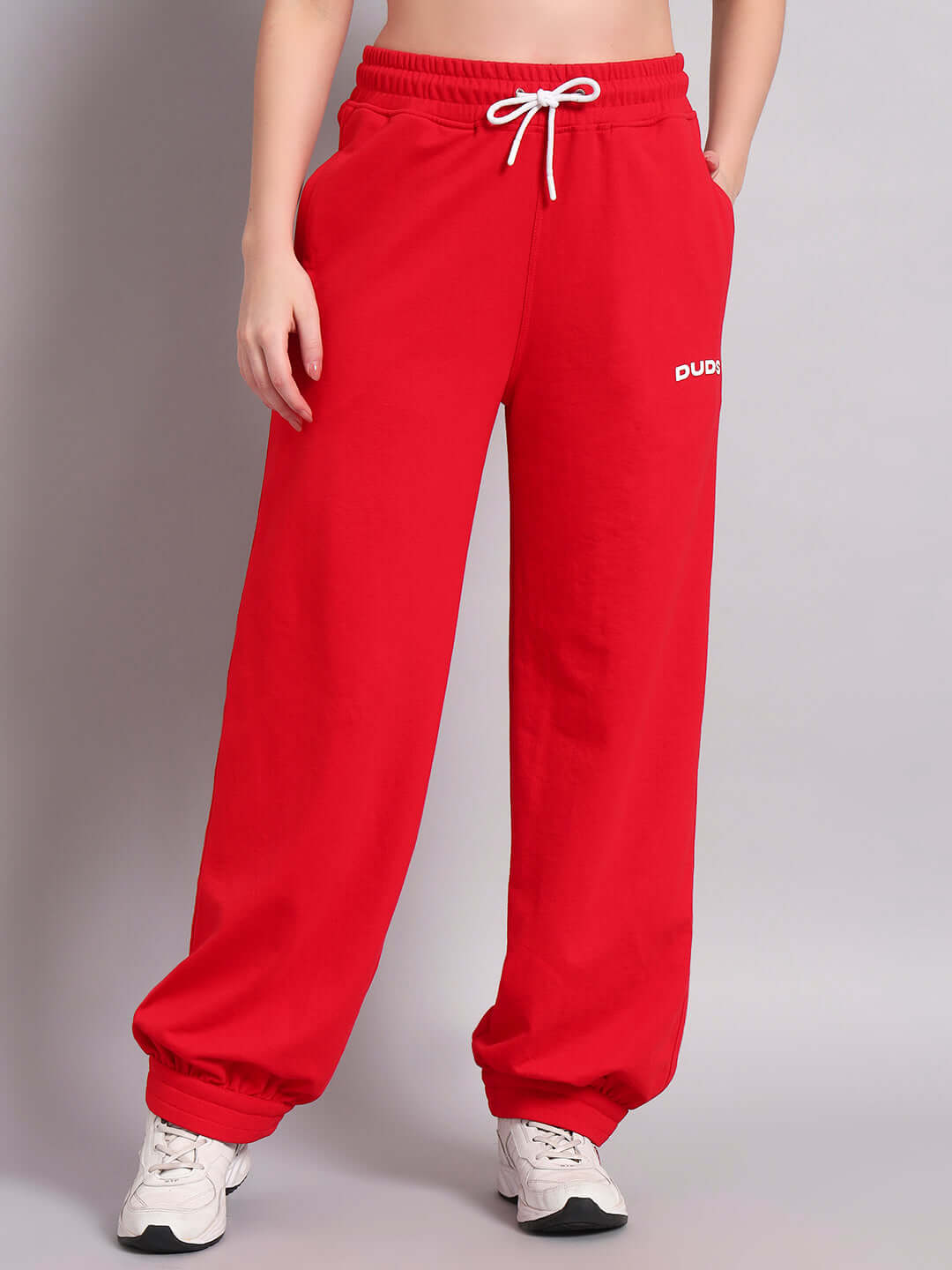 Women's Austrian relaxed-fit red joggers by DUDS, customizable size, made to order by experienced tailors, comfortable and stylish.