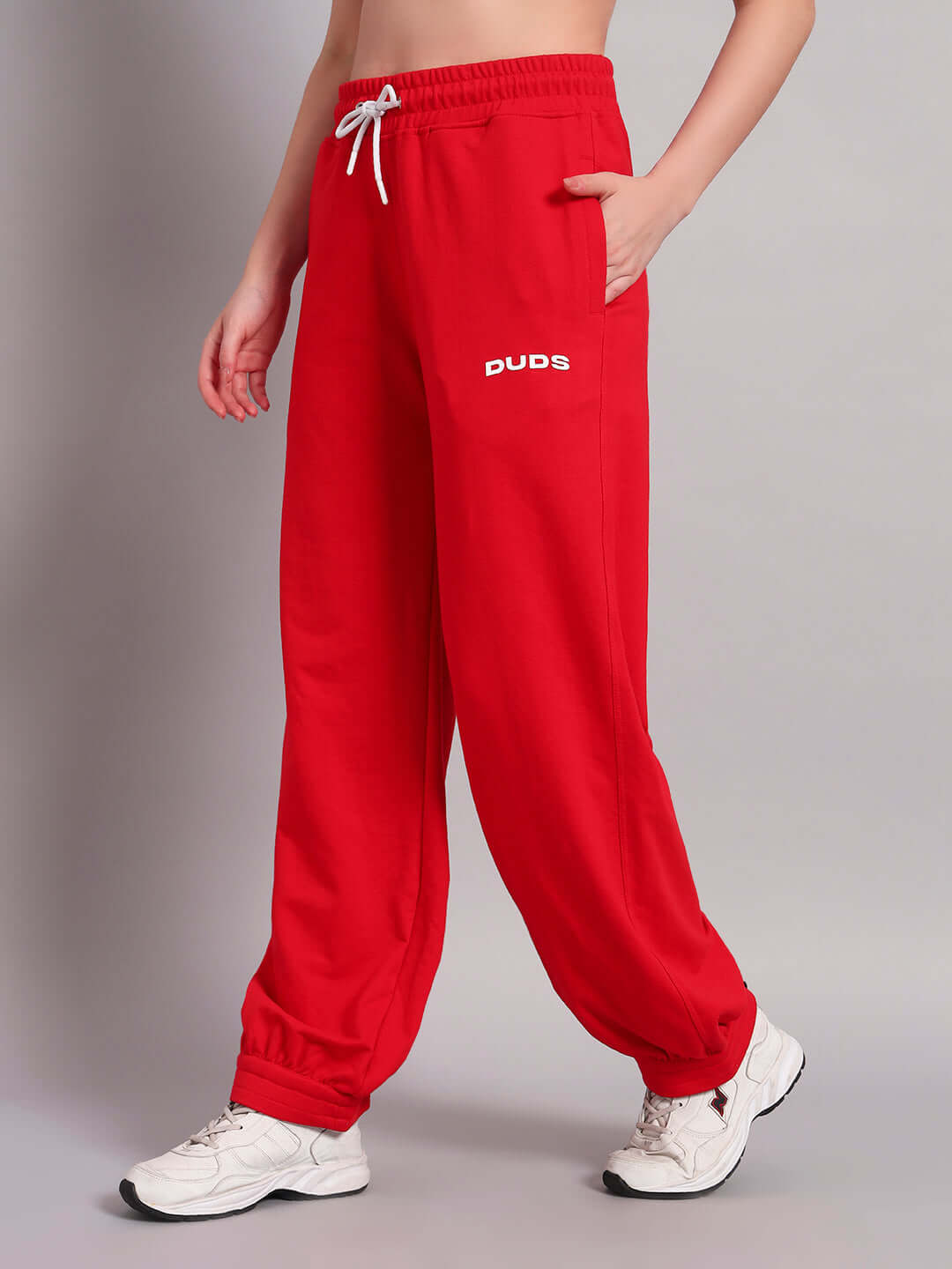 Red women's Austrian relaxed-fit joggers by DUDS, featuring comfortable design and customizable fit option.