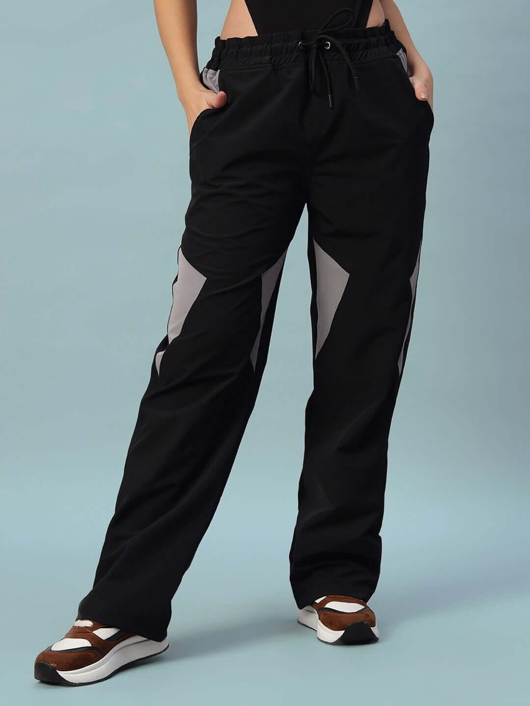 Black women's ranger relaxed fit cargo pants with custom fit option, featuring side pockets and stylish design.