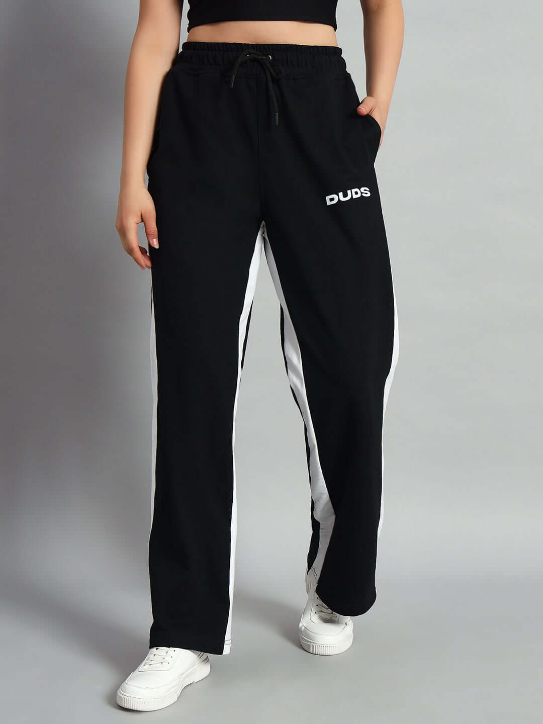 Women's Side Seam Baggy Joggers in black with DUDS logo, featuring a relaxed fit, customized size options, and experienced tailoring.