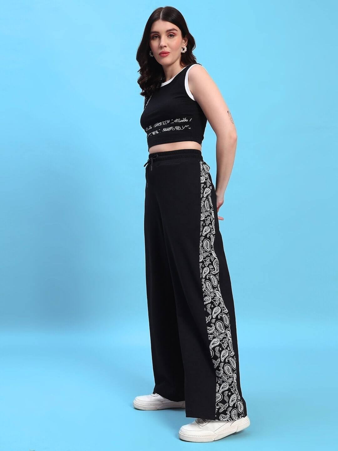 Model wearing Women's Squaro Designer Co-ord Set Black with patterned side detailing, showcasing high-fashion design and comfort.