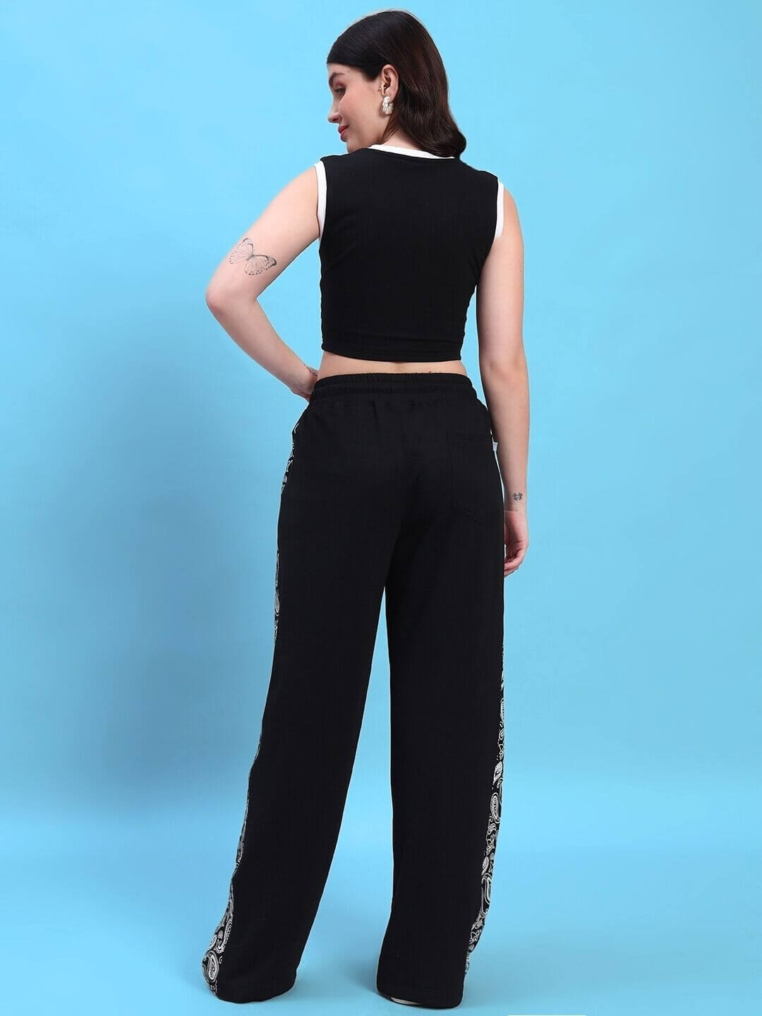 Back view of model wearing Women's Squaro Designer Co-ord Set Black showcasing stylish high-fashion co-ord ensemble.