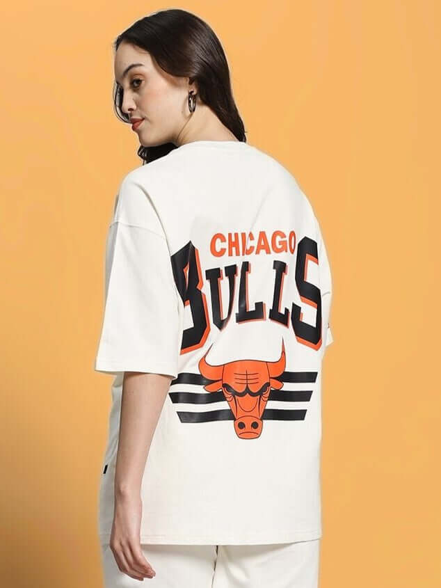 Women's oversized off-white t-shirt with Chicago Bulls print, featuring premium cotton fabric. Perfect for casual style and comfort. Back view.