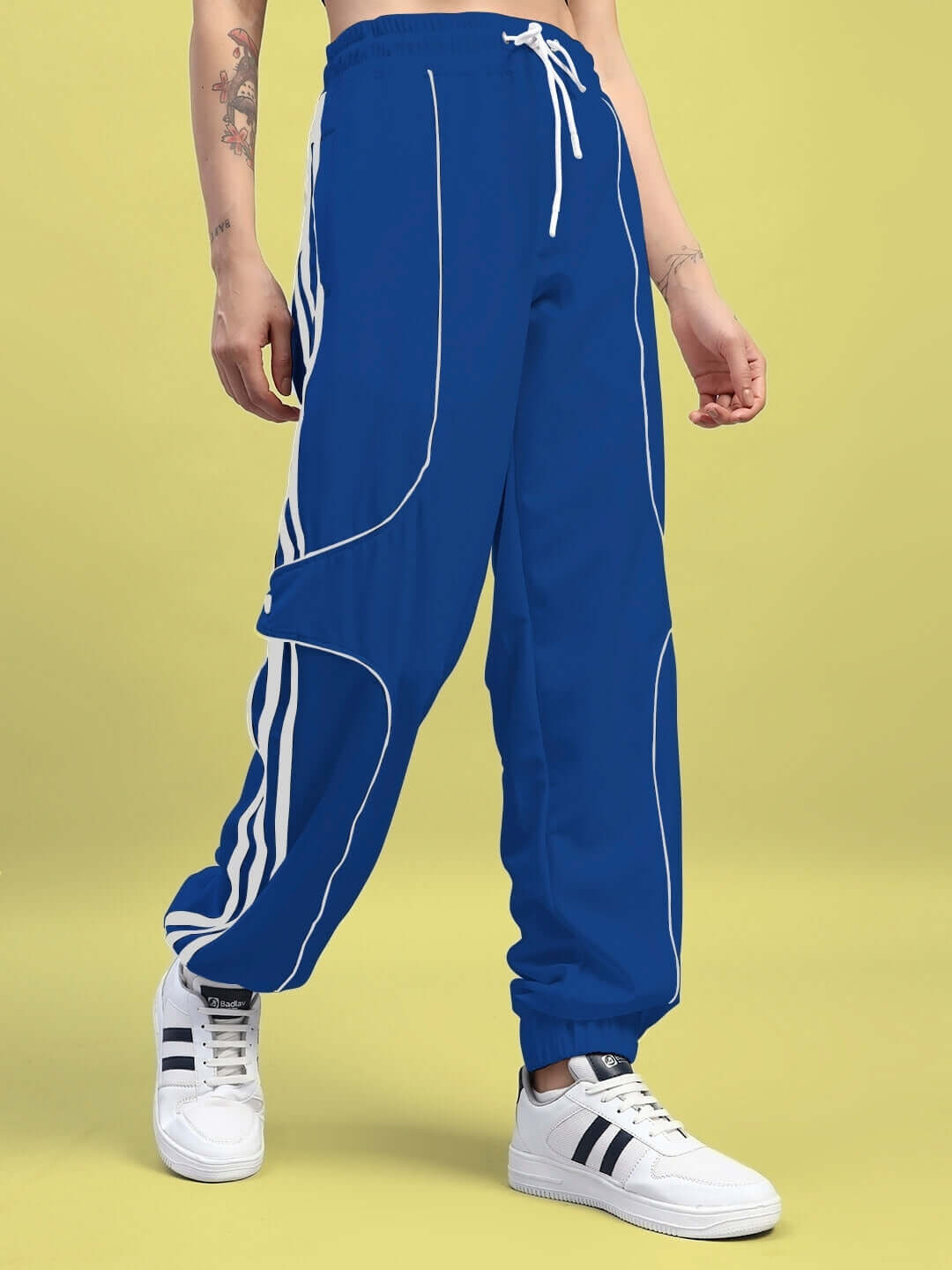 Women's blue relaxed-fit joggers with stripes, customizable size option, perfect for comfortable fashion wear.
