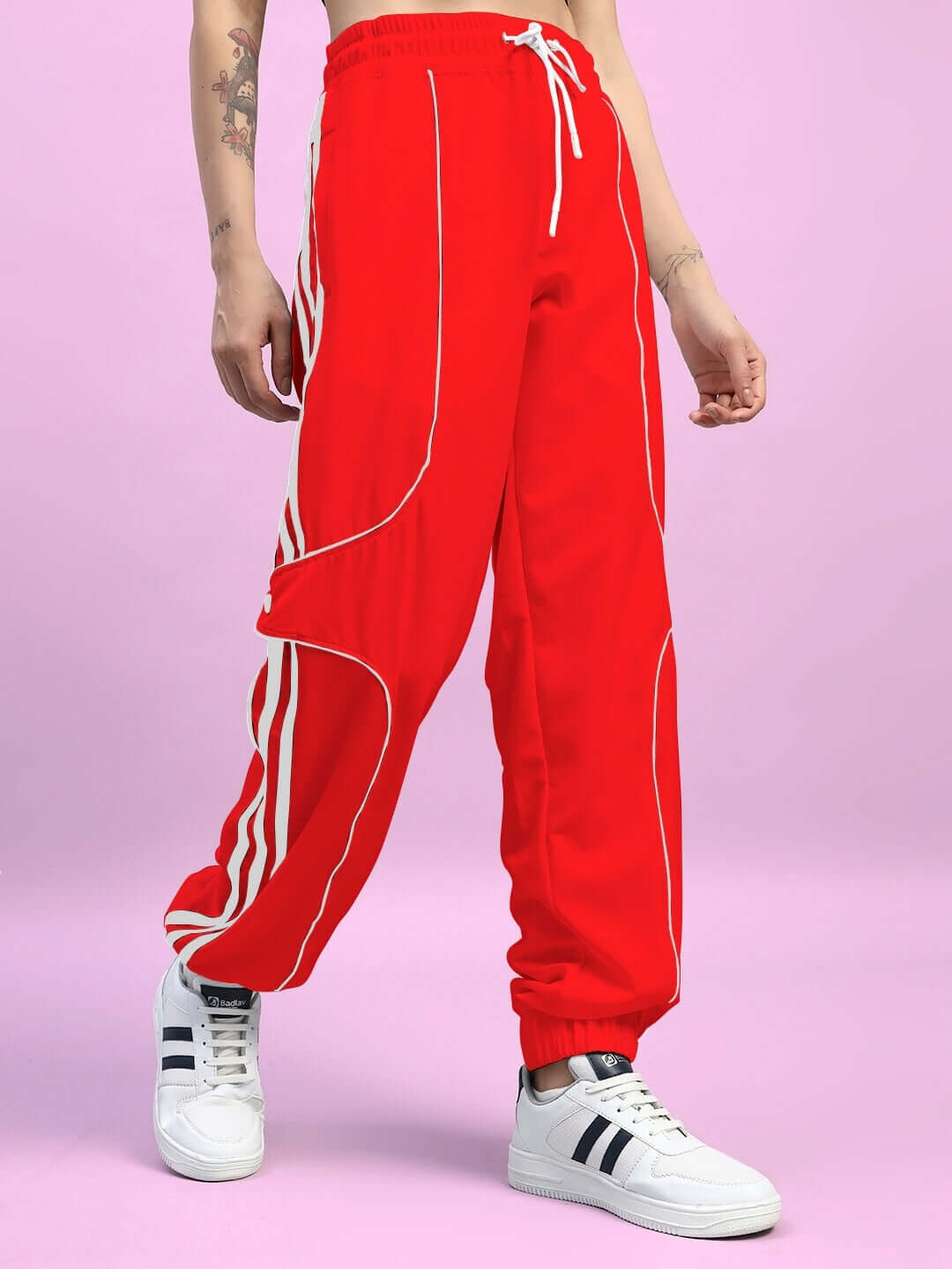 Women's red relaxed-fit joggers with white stripes, customizable for size, perfect for casual style and comfort.