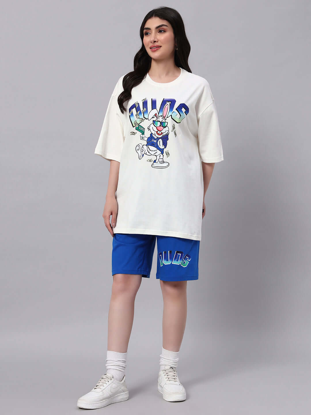 Woman wearing off-white and blue Bugs Bunny co-ord set made of premium cotton fabric.