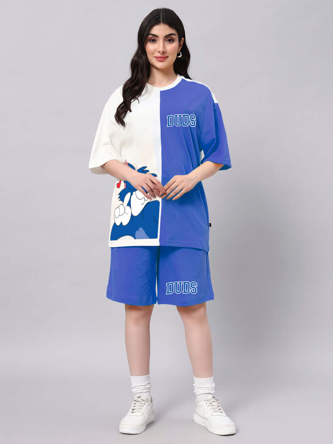 Woman wearing WOMEN CAPER TOM CO-ORD SET BLUE OFF-WHITE, featuring a chic, breathable cotton-blend outfit ideal for summer.