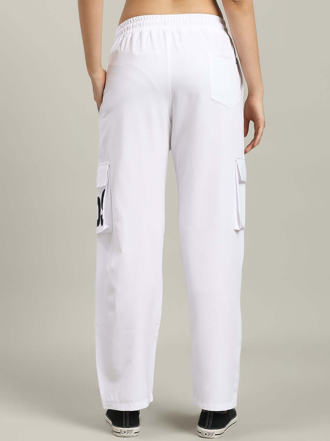 Rear view of WOMEN'S CARMINE RELAXED FIT JOGGER WHITE, showcasing comfortable and stylish design.