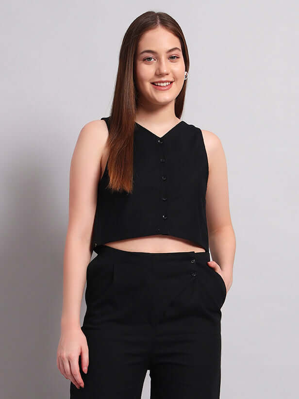Model wearing Women's Chic Crop-Top in Black made of premium cotton twill fabric, showcasing stylish, comfortable fit.