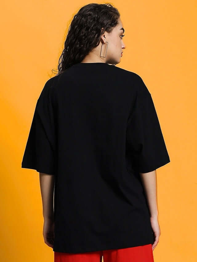 Back view of women's black Columbia 22 oversized T-shirt, made from premium cotton blend fabric for comfort and style.