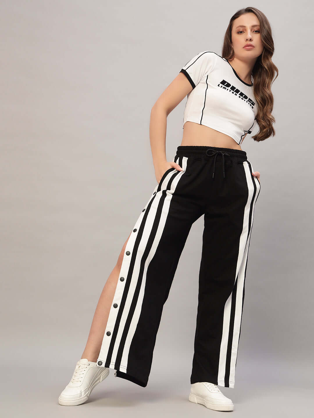 Women's black-white Dancer Joggers featuring side stripes, perfect for casual style and comfort. Custom size option available.