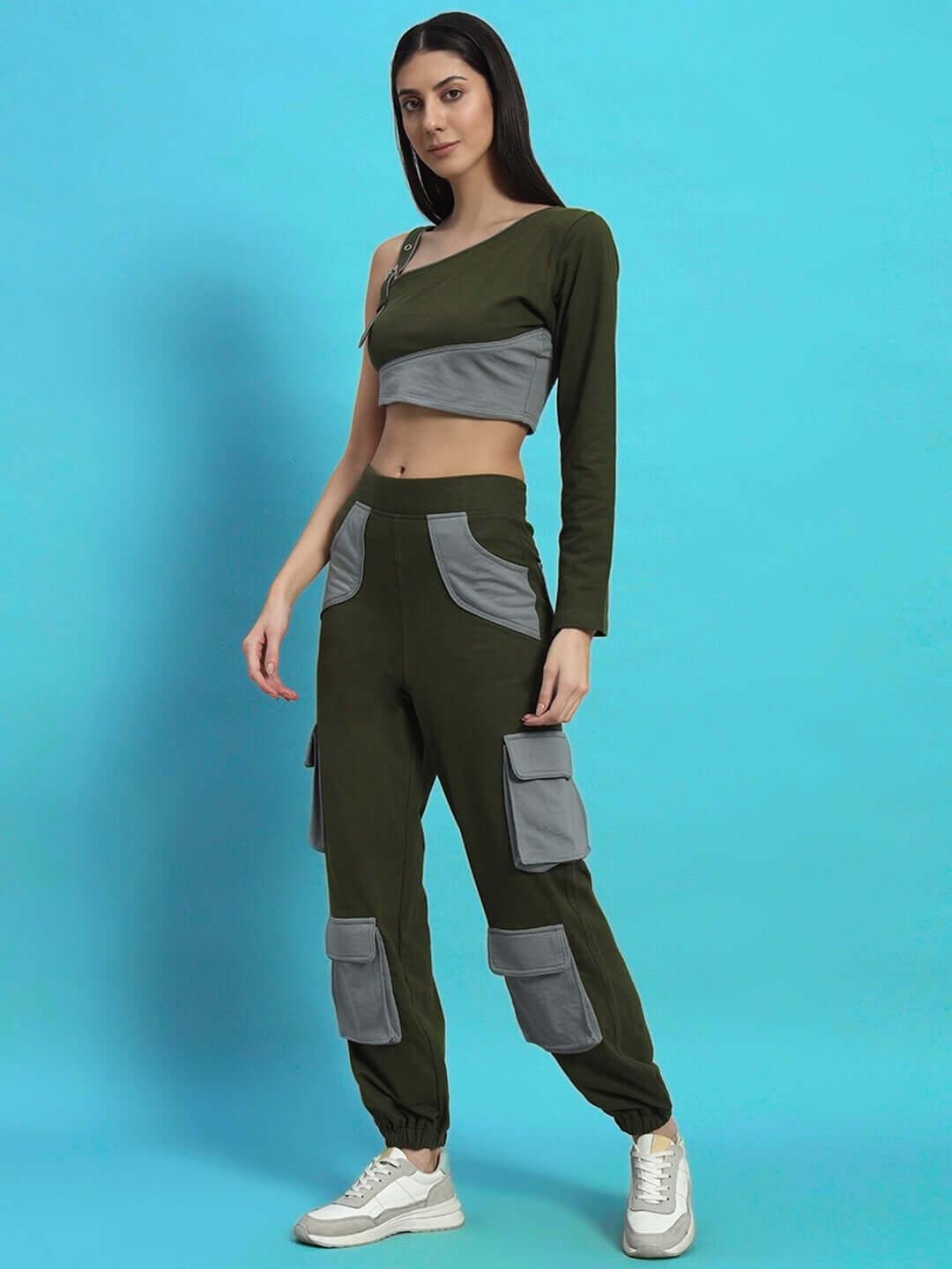 Woman wearing WOMEN'S DANIEL CO-ORD SET OLIVE GREY with stylish design, showcasing contemporary fashion in an olive and grey color combination.