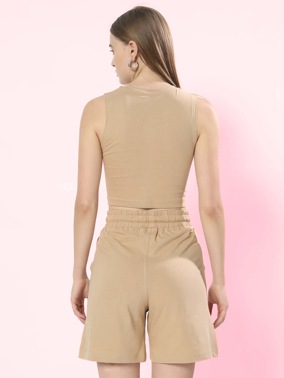 Back view of women's dark nude co-ord set, featuring premium cotton fabric with elastic waist shorts, ideal for casual wear.