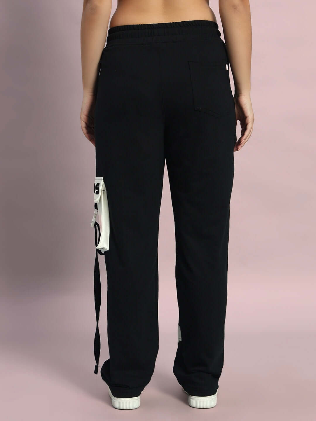 Back view of Women's David Jogger in black with pocket detail, made by DUDS Tailors. Available in custom sizes for prepaid orders.