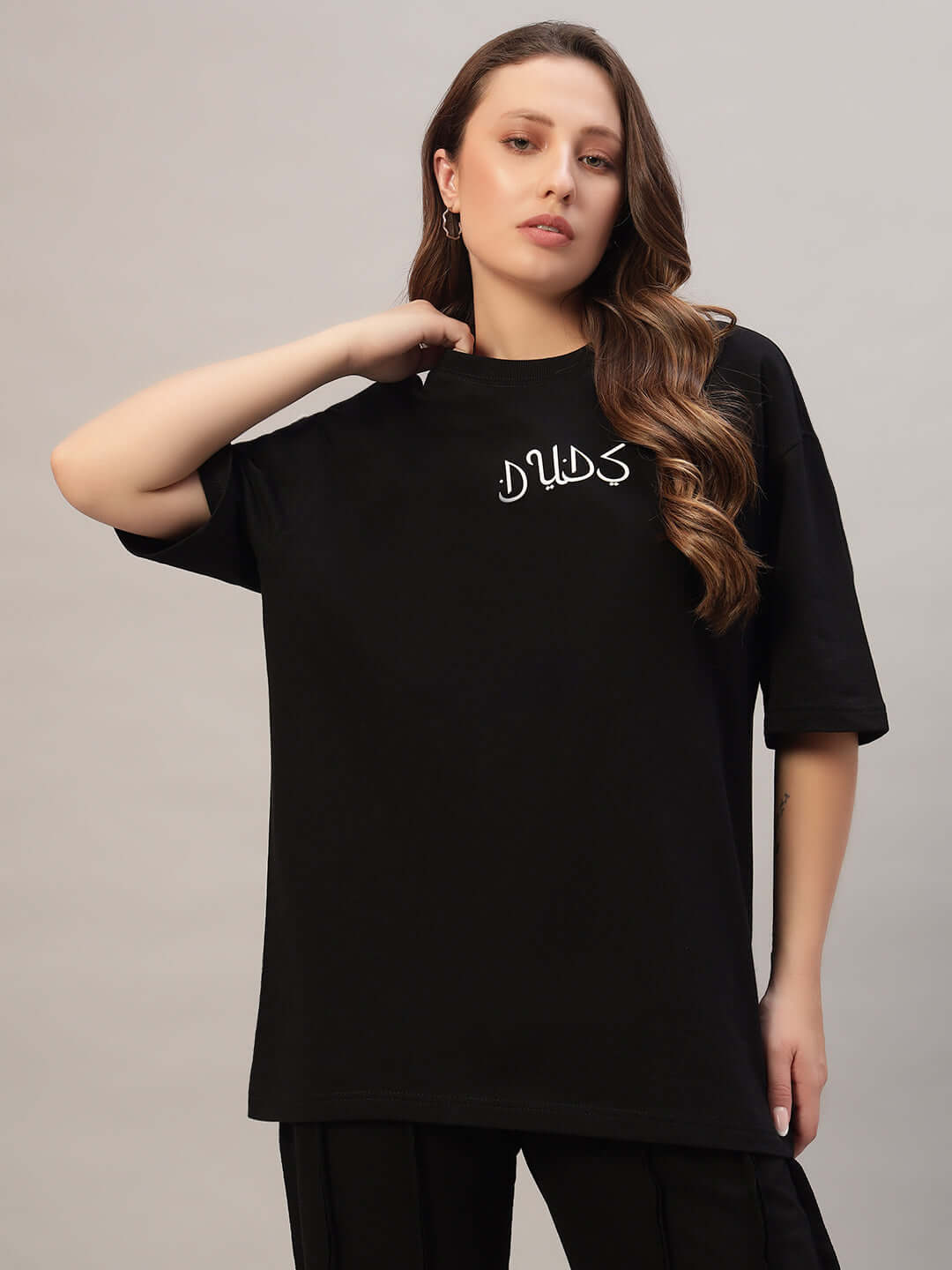 Women's over-sized black T-shirt made from premium cotton with French terry, by Color By Colours. Fashionable and comfortable wear.