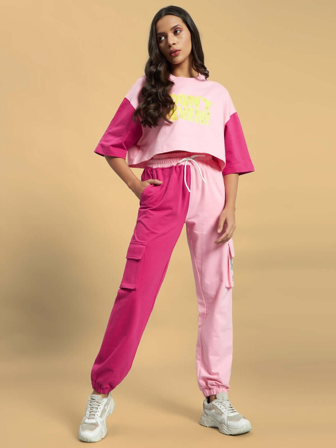 Model wearing Women's Pink Don't Even Co-ord Set with print. Made from French Terry Lycra and Elastane. Stylish and comfortable fashion.