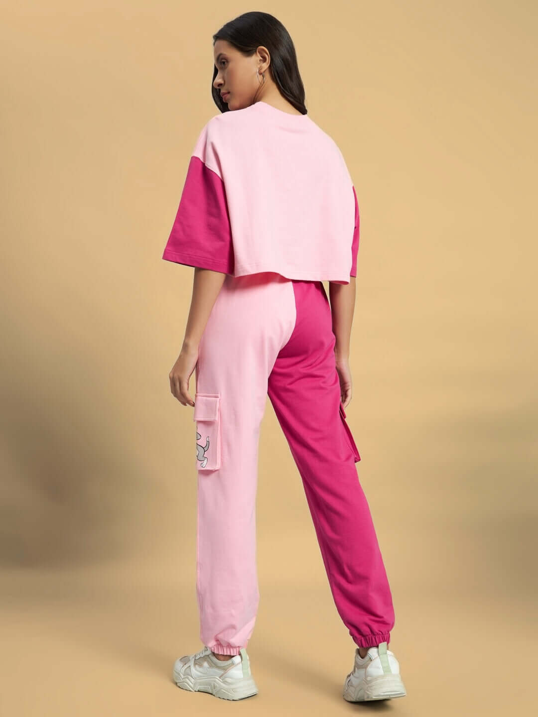 Women's pink co-ord set in premium cotton terry fabric, featuring a casual design with a stylish print. Perfect for trendy outfits.