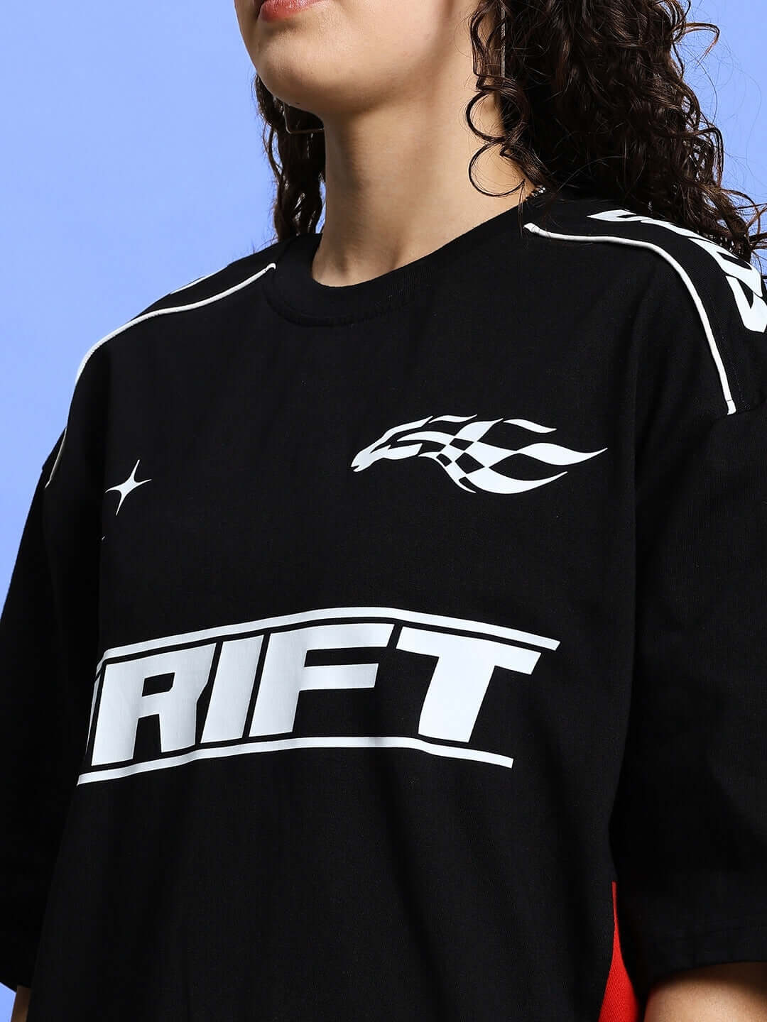 Close-up of a black t-shirt from the Women's Drift Summer Co-Ord Set Black with racing graphics, showcasing style and detail.