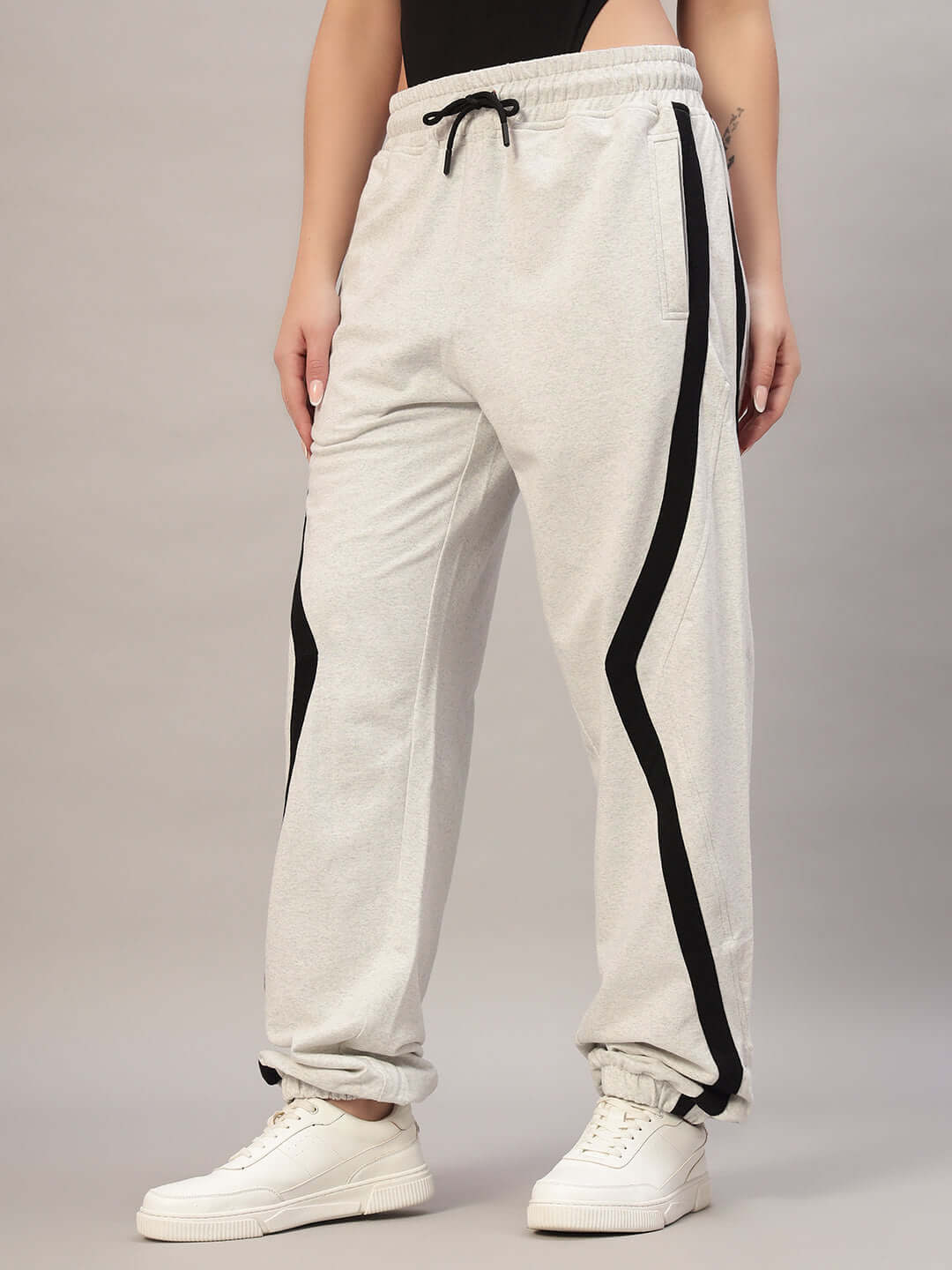 Women's DUDS Frame Joggers in melange grey with black accents, featuring a comfortable fit and made-to-order craftsmanship.