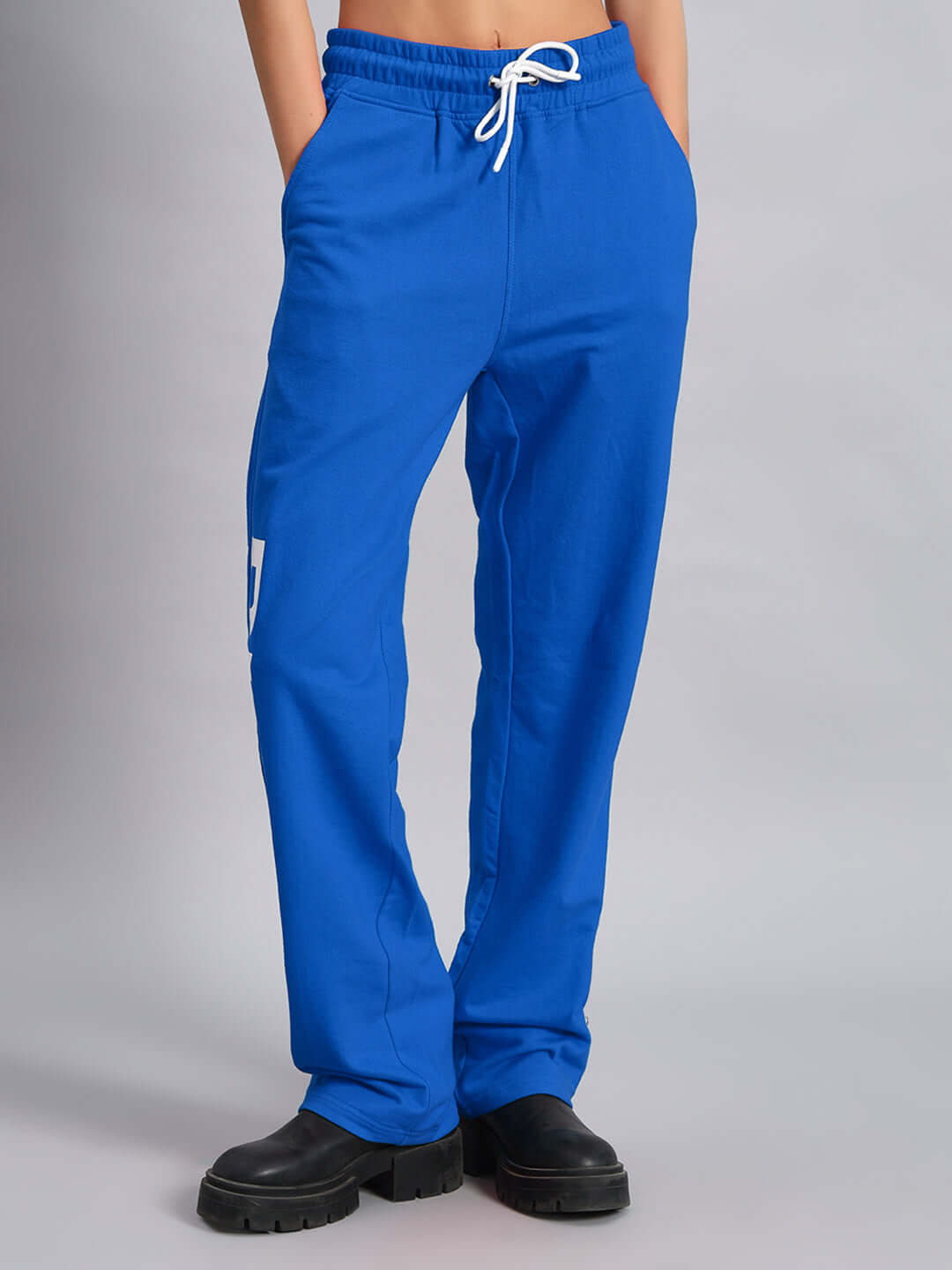 Limited edition blue women's joggers by DUDS, available for custom fit, made to order by experienced tailors.